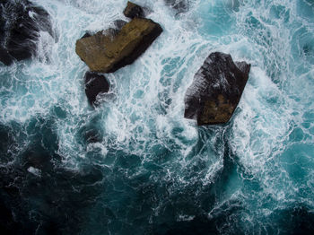 Waves splashing on rocks