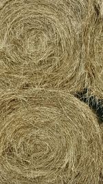 Full frame shot of hay bales on field