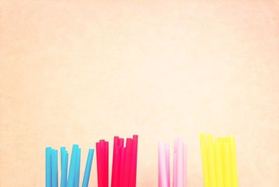Close-up of colorful pencils on white background