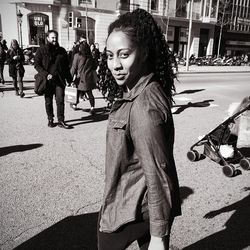 Women walking on street in city