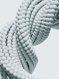 Close-up of rope against white background