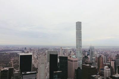 Modern buildings in city against sky