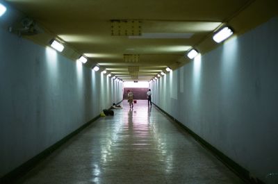 Interior of illuminated underground walkway