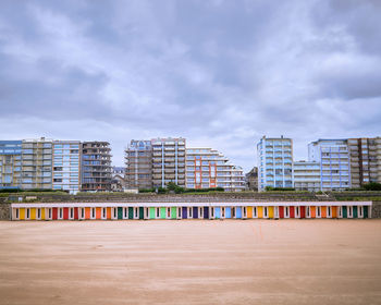 Buildings in city against sky