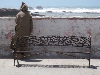 Rear view of a man on beach