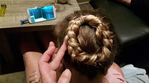 Midsection of woman at home