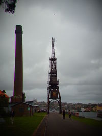 View of built structure on landscape against sky