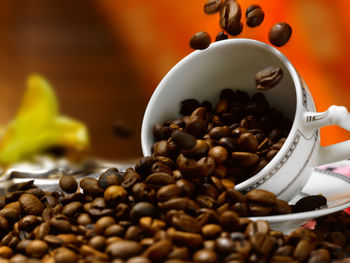Close-up of coffee beans on table