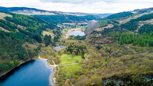 Scenic view of landscape and mountains against sky