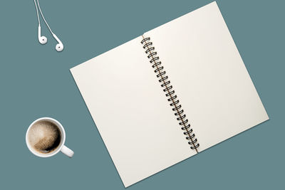 High angle view of coffee cup on table