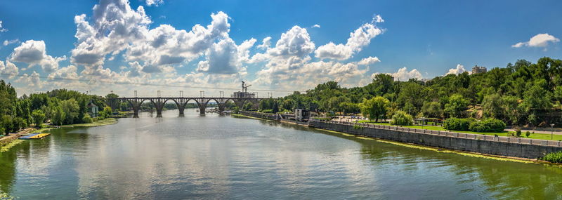 Monument to the fallen afghan warriors on the dnipro embankment in ukraine on a sunny summer day