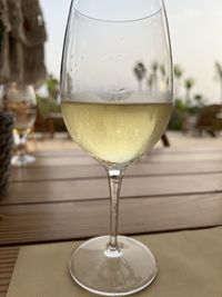 Close-up of wineglass on table