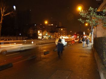 Illuminated street light at night