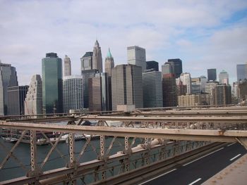 Modern buildings in city against sky