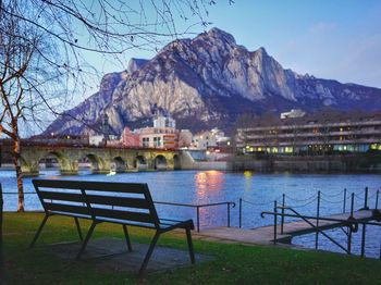 Scenic view of lake and mountains against clear sky