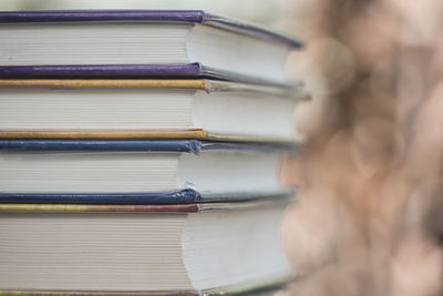 Close-up of books stacked