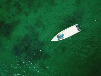 High angle view of sailboat sailing in sea