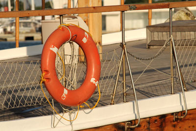 Close-up of metal railing by swimming pool