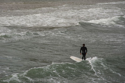 Man standing in sea