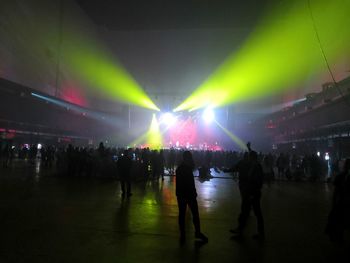 Silhouette people at music concert