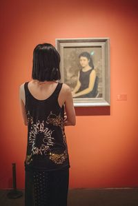 Close-up of woman standing in pond