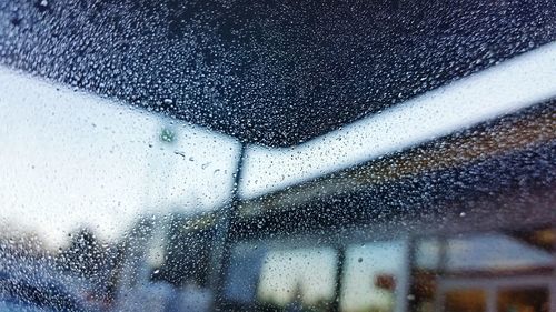 Close-up of water drops on glass