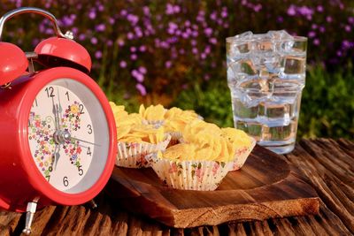 Close-up of clock on table