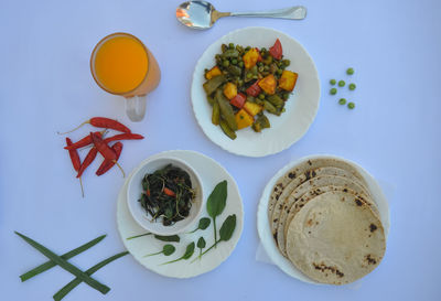 High angle view of fruits in plate on table