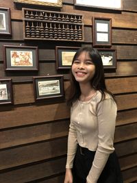 High angle view of woman sitting on hardwood floor