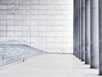 Empty corridor of building with colonnade