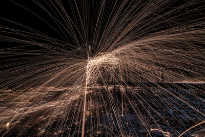 Firework display at night