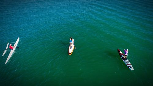 High angle view of people on boat in water