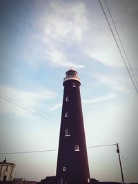 Low angle view of lighthouse against sky