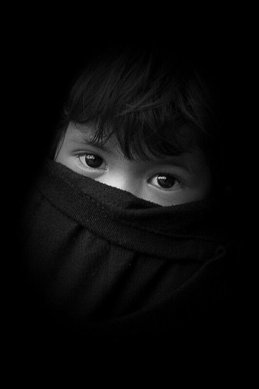 hiding, childhood, one person, dark, children only, headshot, looking at camera, child, spooky, one boy only, black background, wrapped, portrait, indoors, people, halloween, human body part, night, close-up, adult