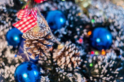 Close-up of christmas decorations on tree