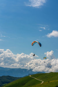 Paragliding from monte baldo over lake garda in italy.