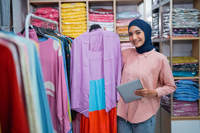 Portrait of woman standing in store