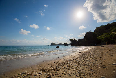 Scenic view of beach against sky