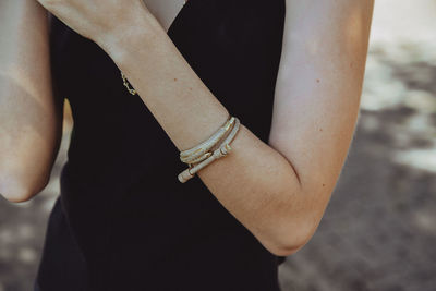 Midsection of woman with hands