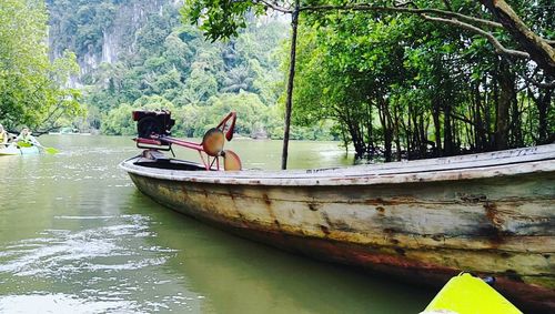 Boat moored in water