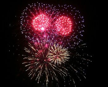 Low angle view of firework display