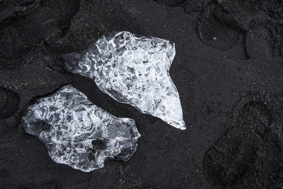 High angle view of ice on beach