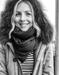 Portrait of a smiling young woman in winter