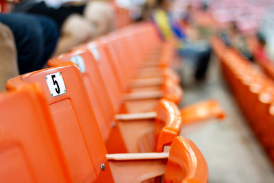 Close-up of empty seats in market