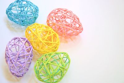 Close-up of colorful candies against white background