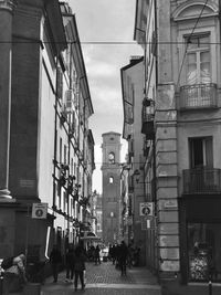 People walking on street in city