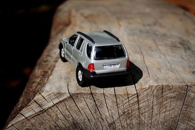 High angle view of toy car on wood