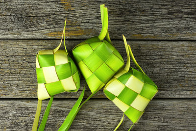 High angle view of green leaves on table