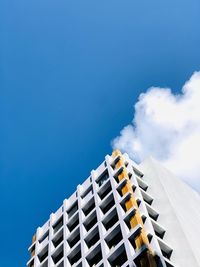Low angle view of building against blue sky