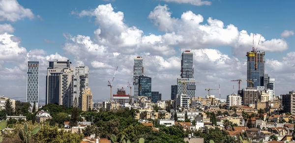 Panoramic view of modern buildings against sky